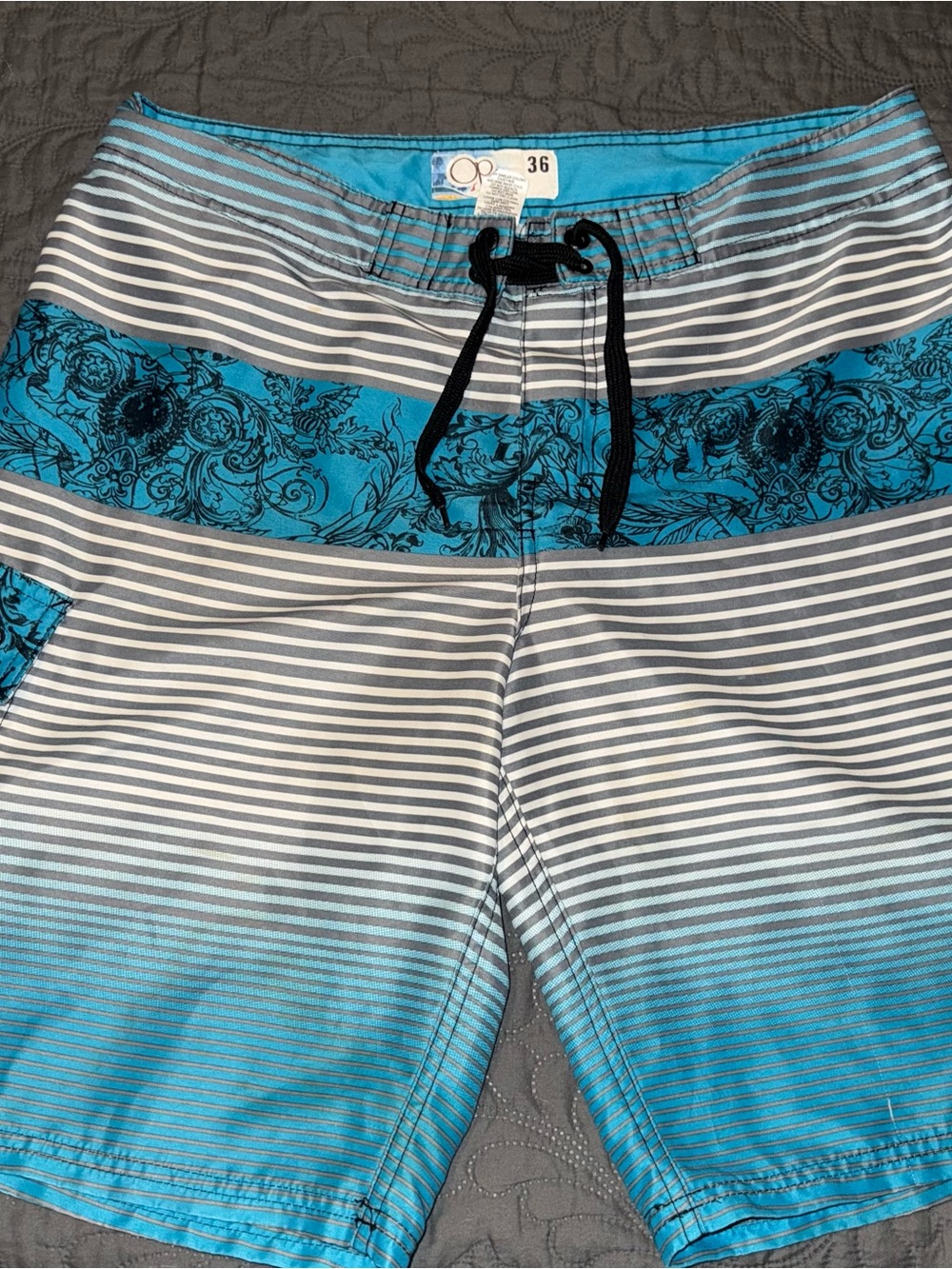 Vintage Y2k Ocean Pacific Men's Graphic Board Shorts Size 36 Blue
Swim Trunks